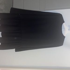 Pretty little things black dress. Size 4. Never worn.